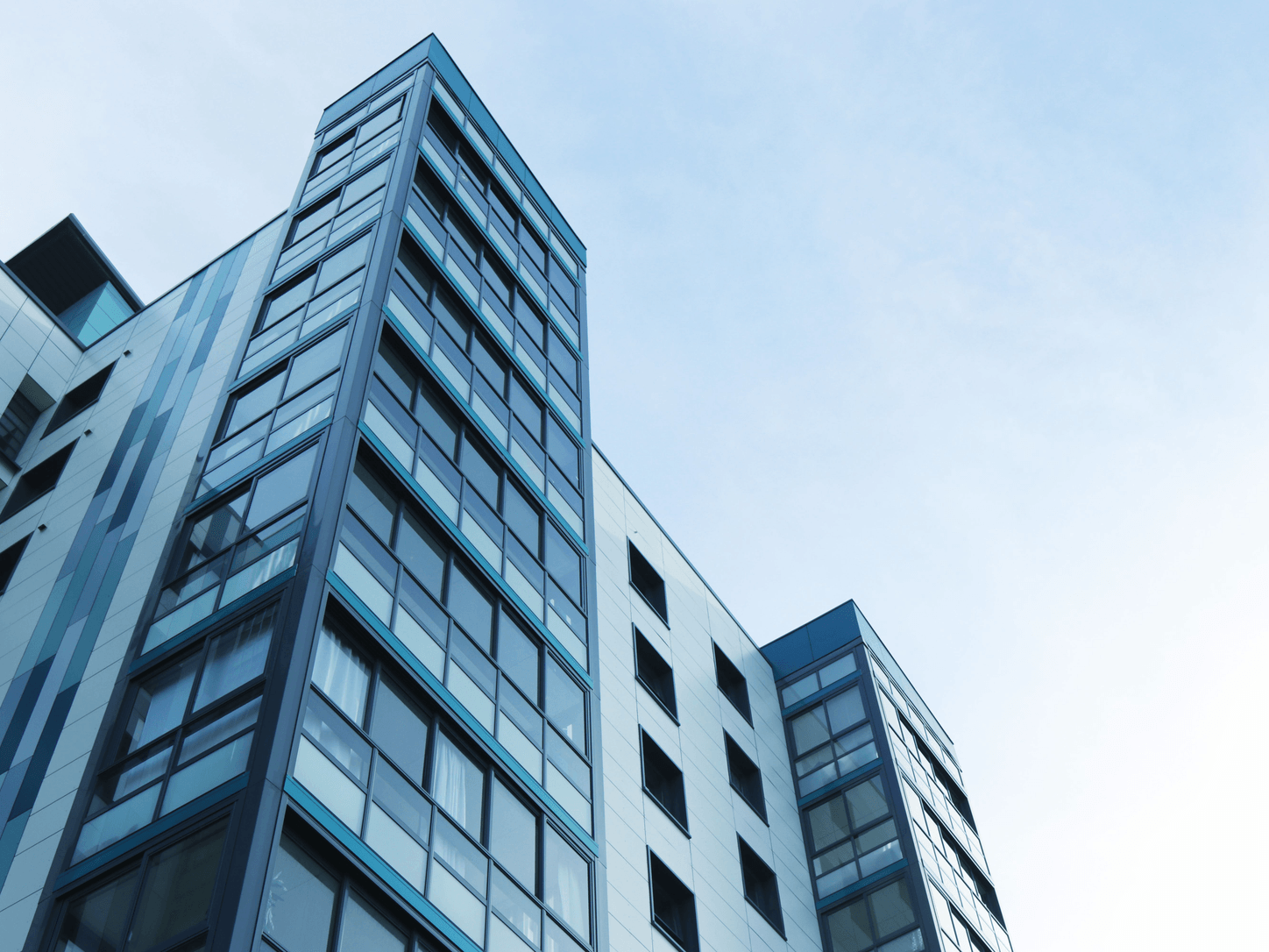 Contemporary commercial building glowing at golden hour